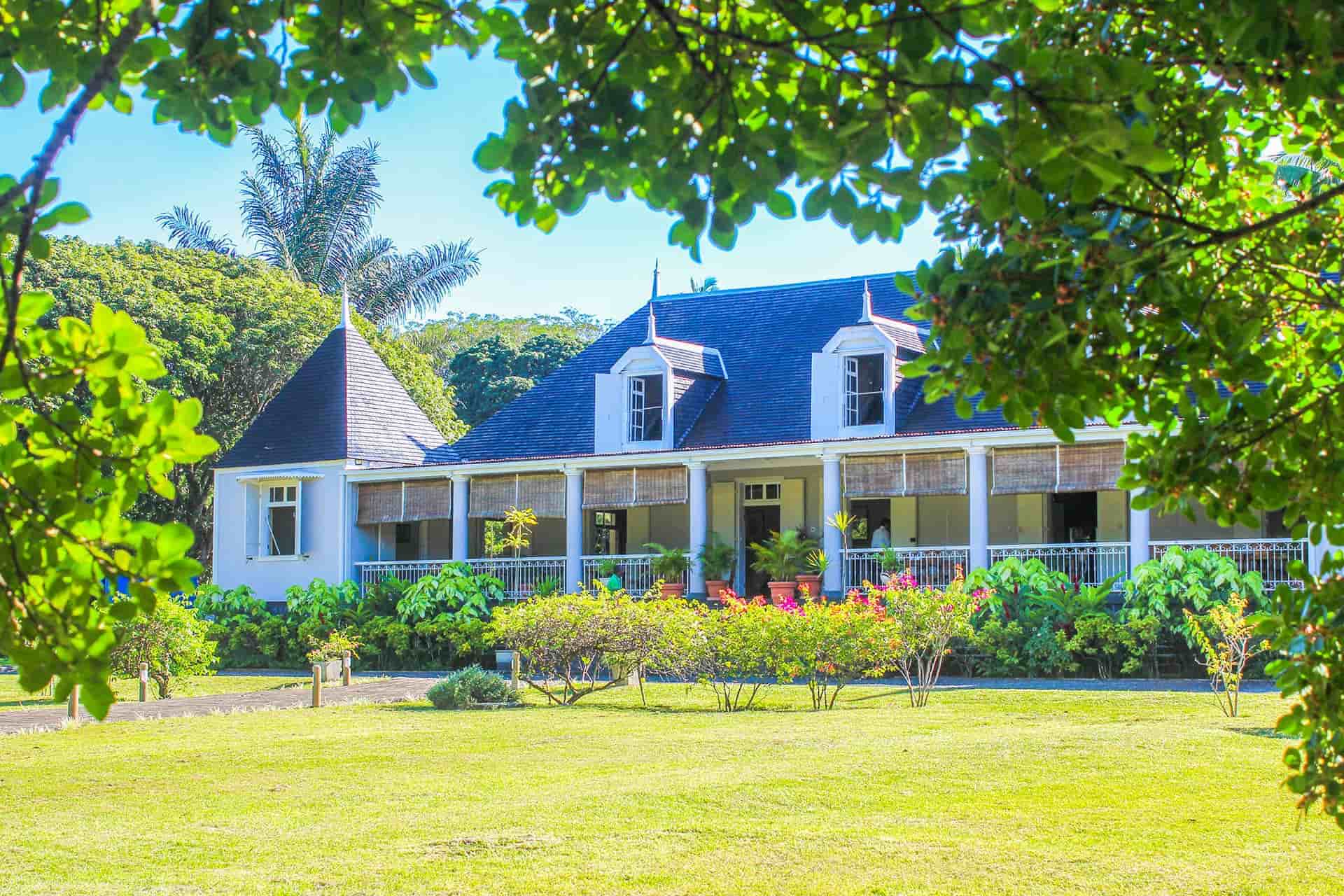 roots saint aubin colonial house mauritius historic wooden colonial house with traditional architecture surrounded by tropical gardens and palm trees