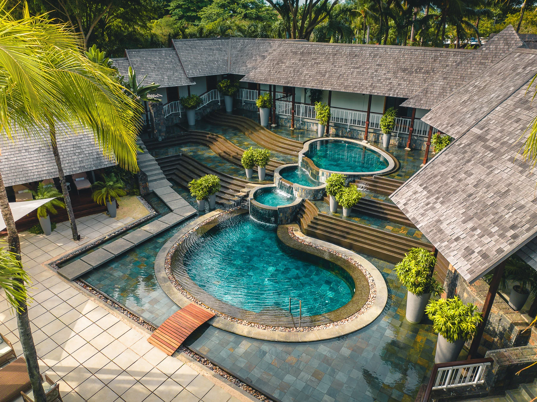 royal palm beachcomber mauritius aerial view of the spa surrounded by tropical gardens and coastline