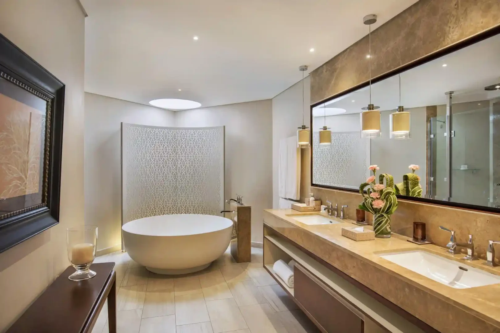 royal palm presidential suite bedroom with attached bathroom, including bathtub, shower, and vanity area