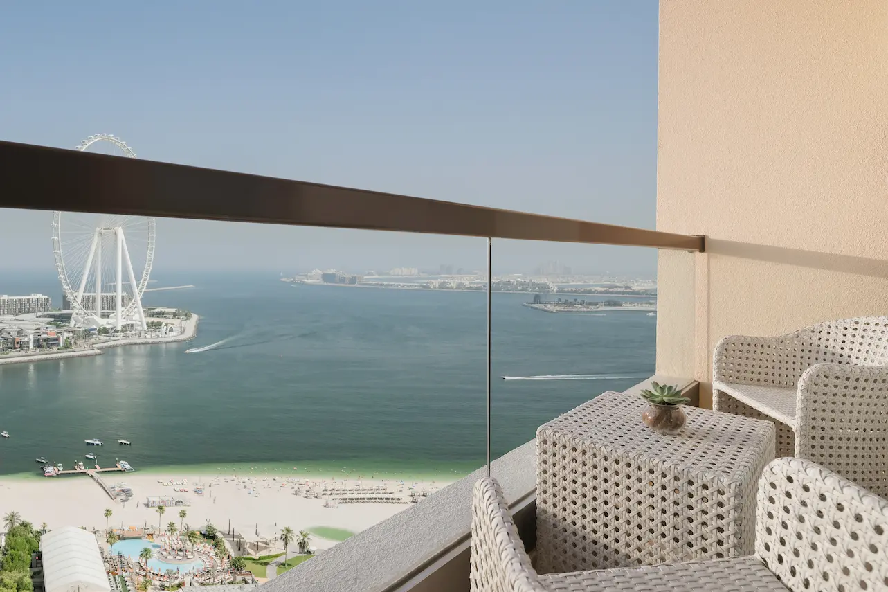 ain dubai view room at ja ocean view hotel balcony with sea and city views