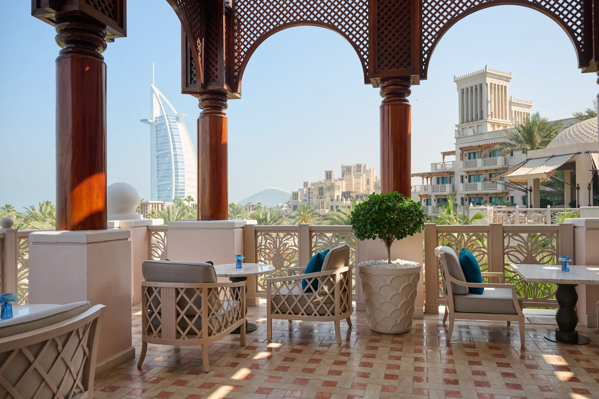 terrace view at al fayrooz lounge in jumeirah al qasr overlooking tranquil waterways and elegant outdoor seating