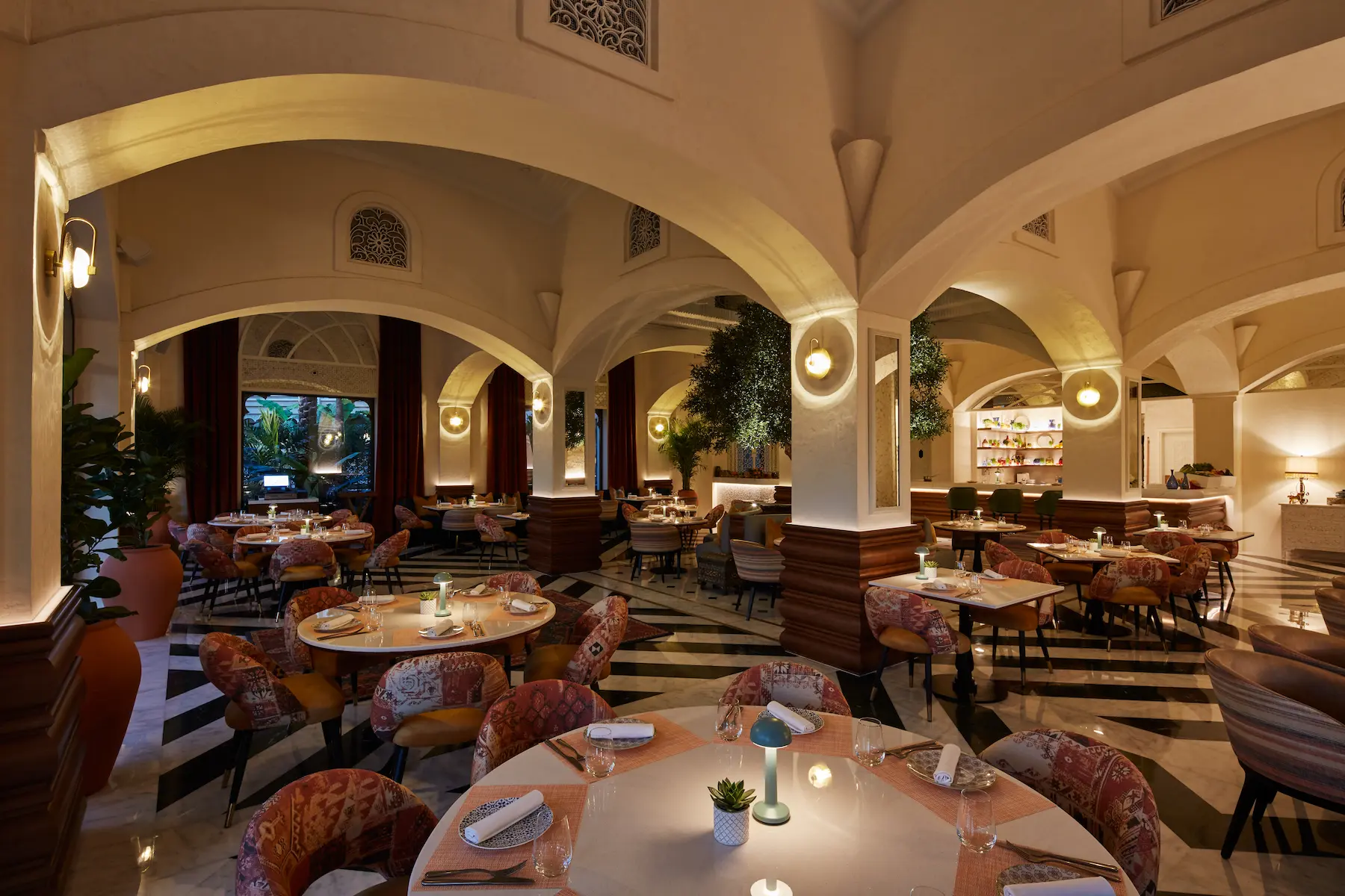 interiors of al nafoorah at jumeirah al qasr showcasing elegant lebanese-inspired décor, warm lighting and refined dining atmosphere
