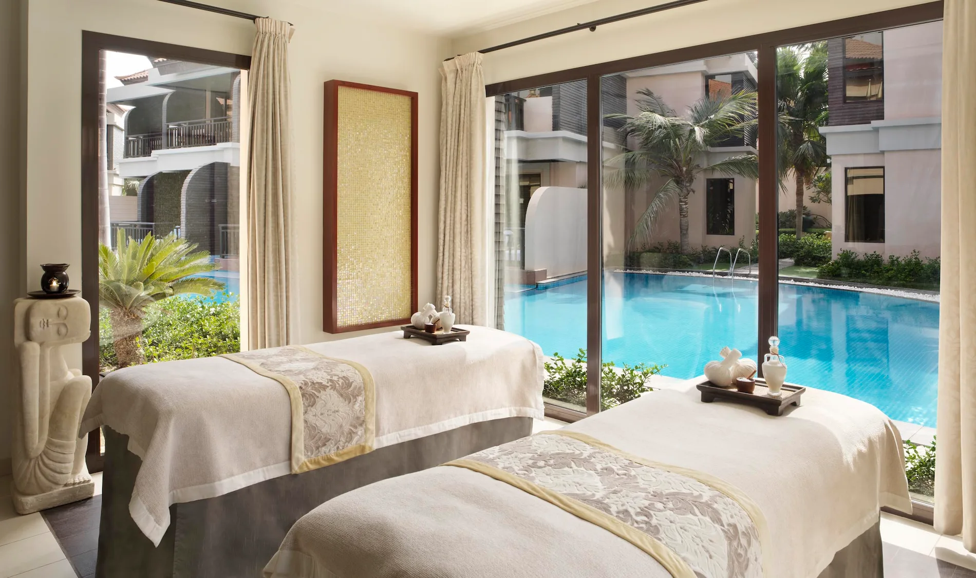 Couples treatment room at Anantara Spa, Anantara The Palm Dubai Resort, designed for private relaxation
