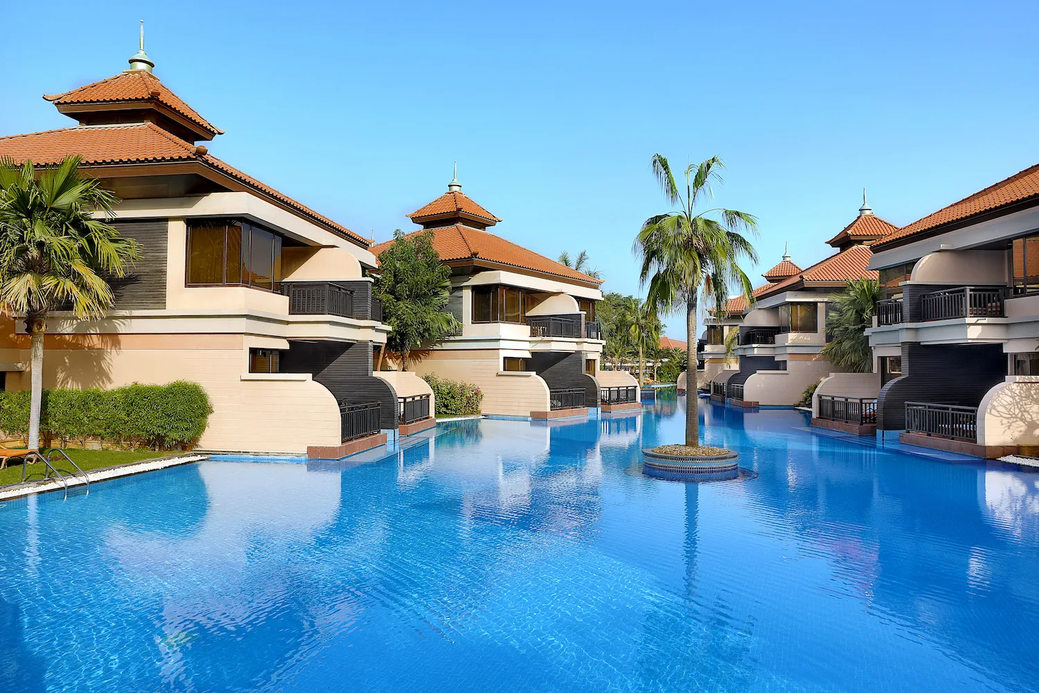 resort exterior and pool area at anantara the palm dubai resort