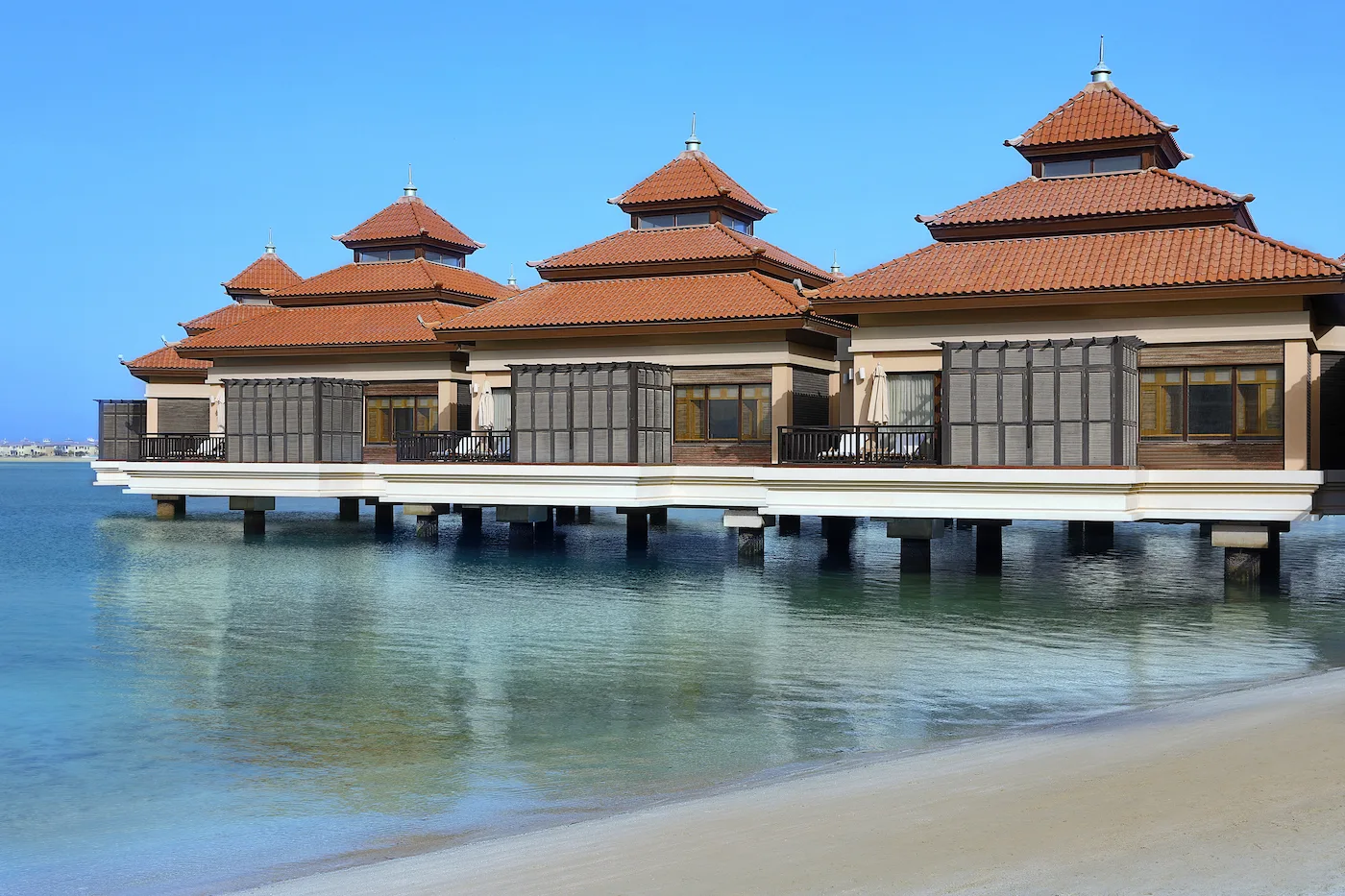 exterior view of anantara the palm dubai resort showcasing water villa