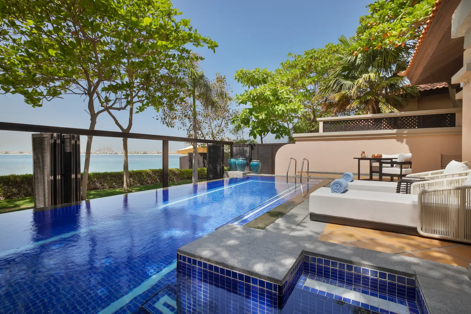 swimming pool of one bedroom beach pool villa at anantara the palm dubai resort