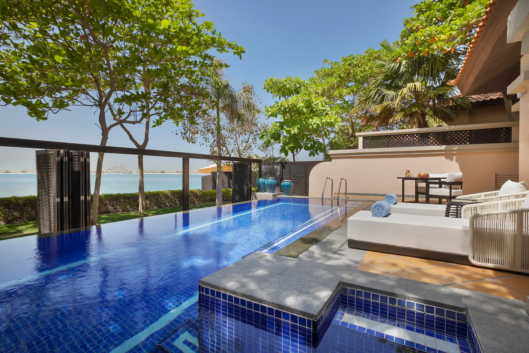swimming pool of one bedroom beach pool villa at anantara the palm dubai resort