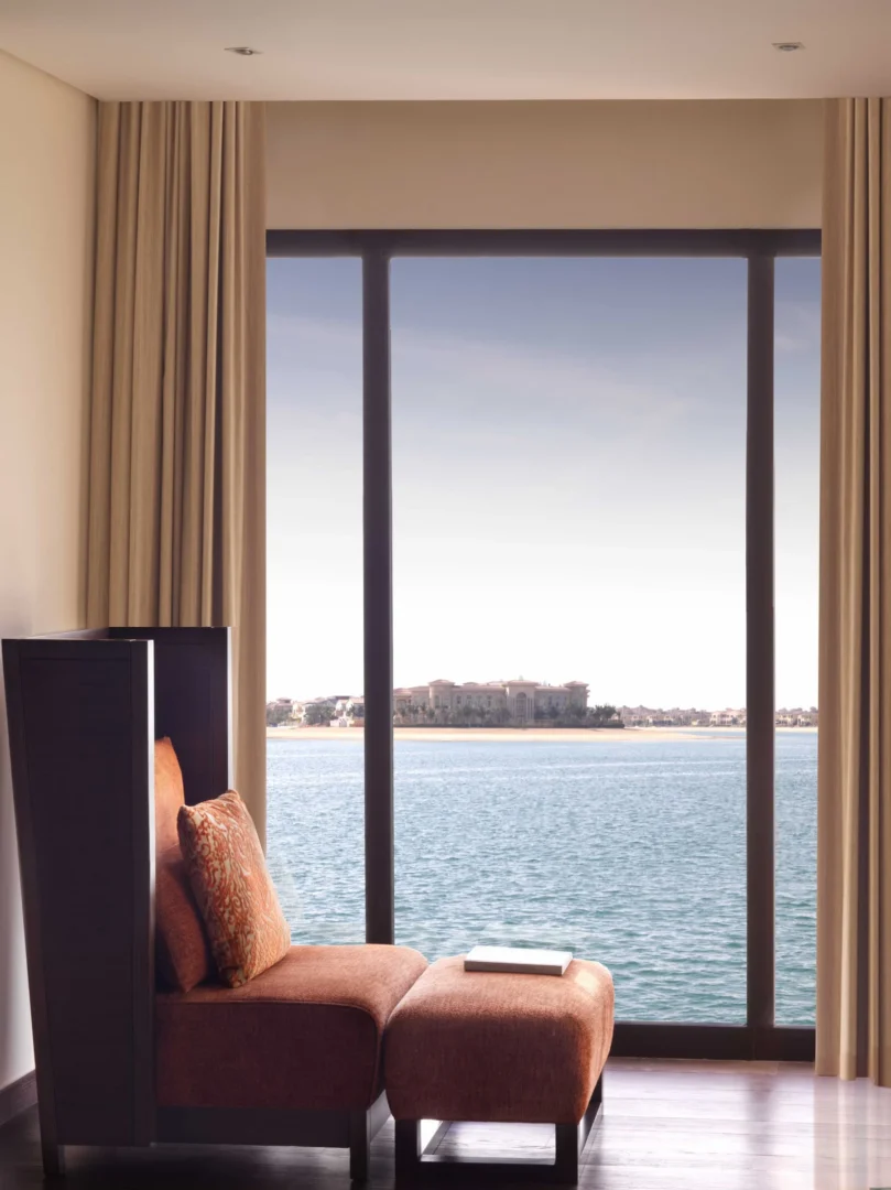 sunset seating area of one bedroom overwater villa at anantara the palm dubai resort on palm jumeirah