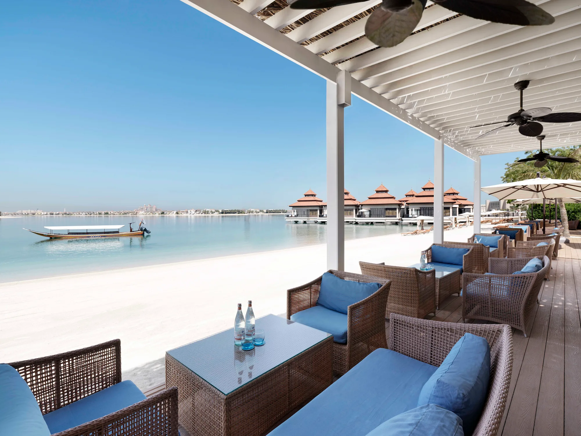 The Beach House restaurant at Anantara The Palm Dubai Resort offering relaxed beachfront dining with Arabian Gulf views