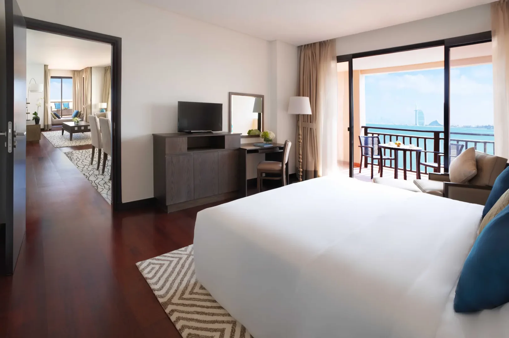 two-bedroom apartment with luxury terrace bedroom at anantara the palm dubai with elegant décor and comfortable bedding