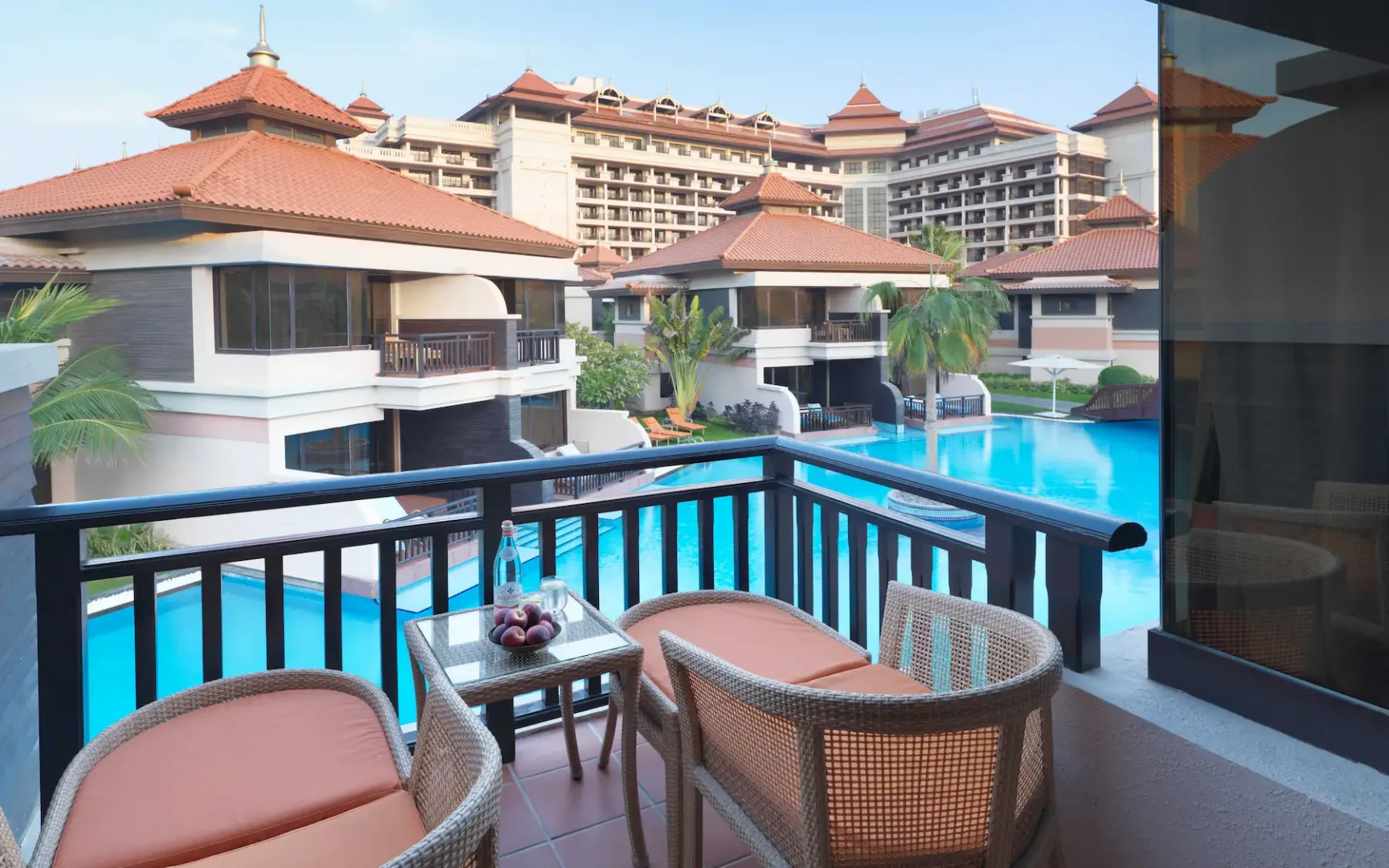 Anantara The Palm Dubai Deluxe lagoon view room seated terrace view