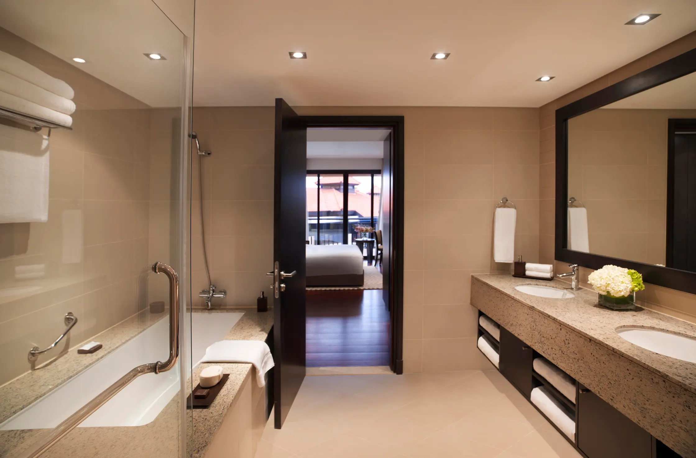 One-Bedroom Apartment bathroom at Anantara The Palm Dubai with modern fixtures and elegant design