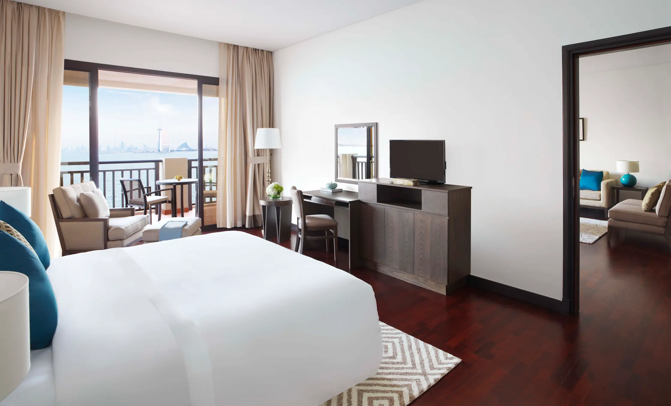 One-Bedroom Apartment bedroom at Anantara The Palm Dubai with comfortable bed and modern décor