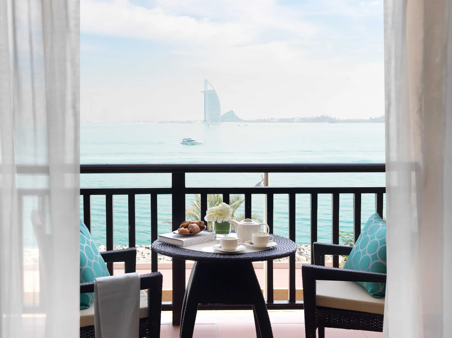 One-Bedroom Apartment at Anantara The Palm Dubai with Burj Al Arab view from the balcony