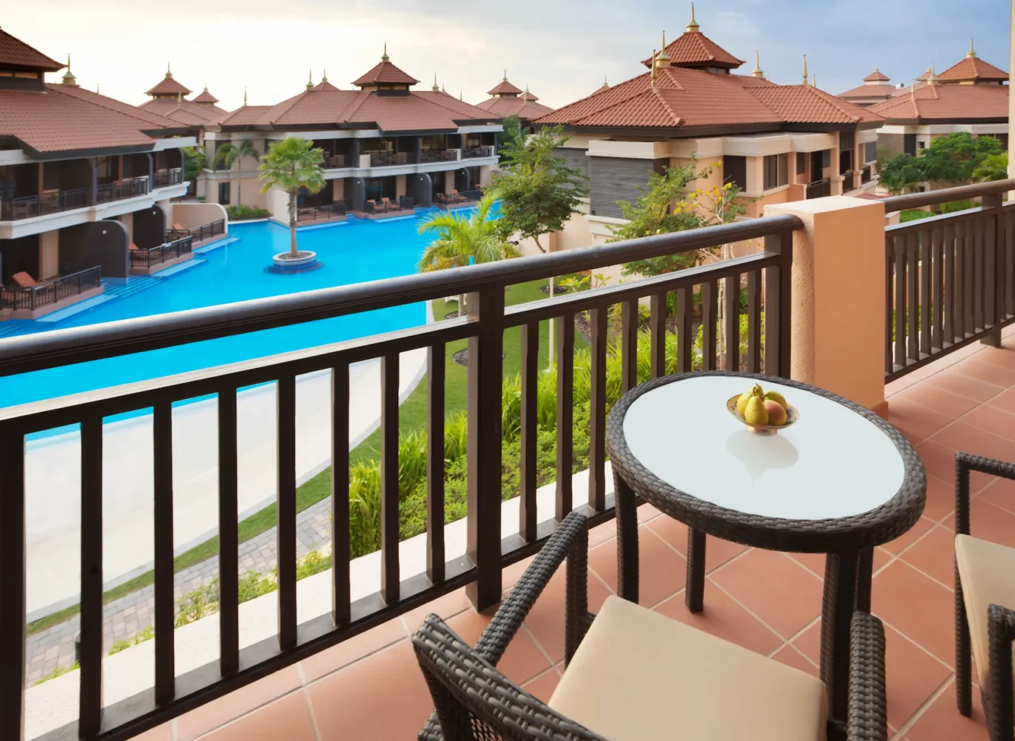 Two-Bedroom Apartment balcony at Anantara The Palm Dubai with outdoor seating and resort views