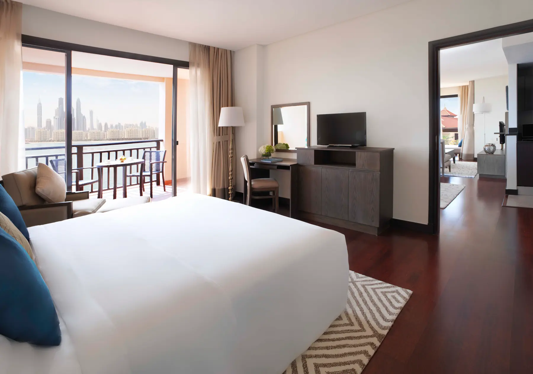 Two-Bedroom Apartment master bedroom at Anantara The Palm Dubai with elegant décor and comfortable bedding