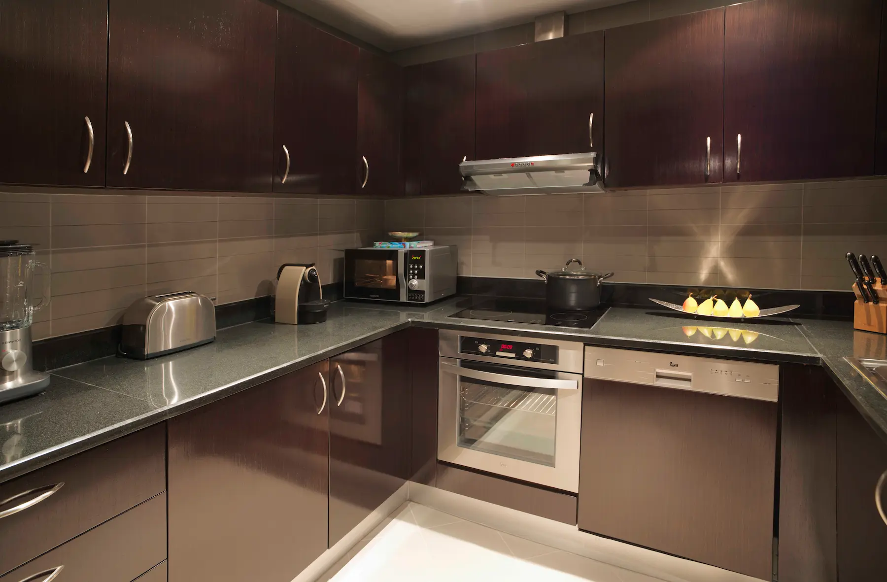 Two-Bedroom Apartment kitchen at Anantara The Palm Dubai with modern appliances and fully equipped layout