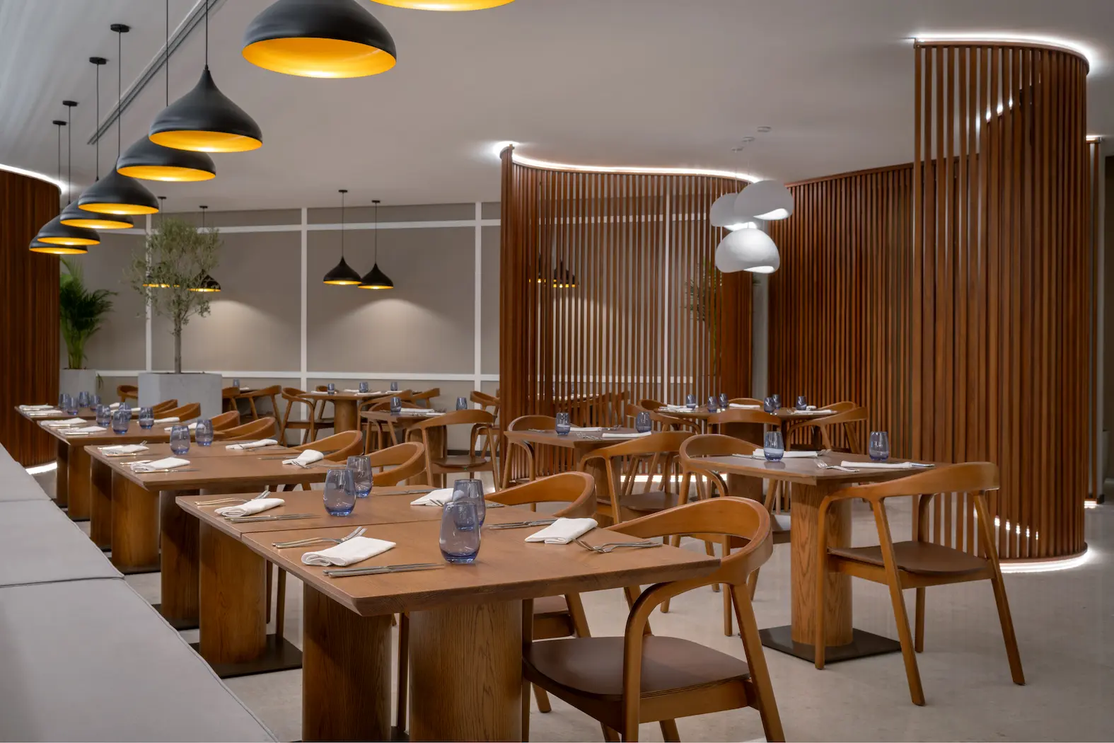 aqua restaurant & bar at ja ocean view hotel with modern dining area and beachfront views