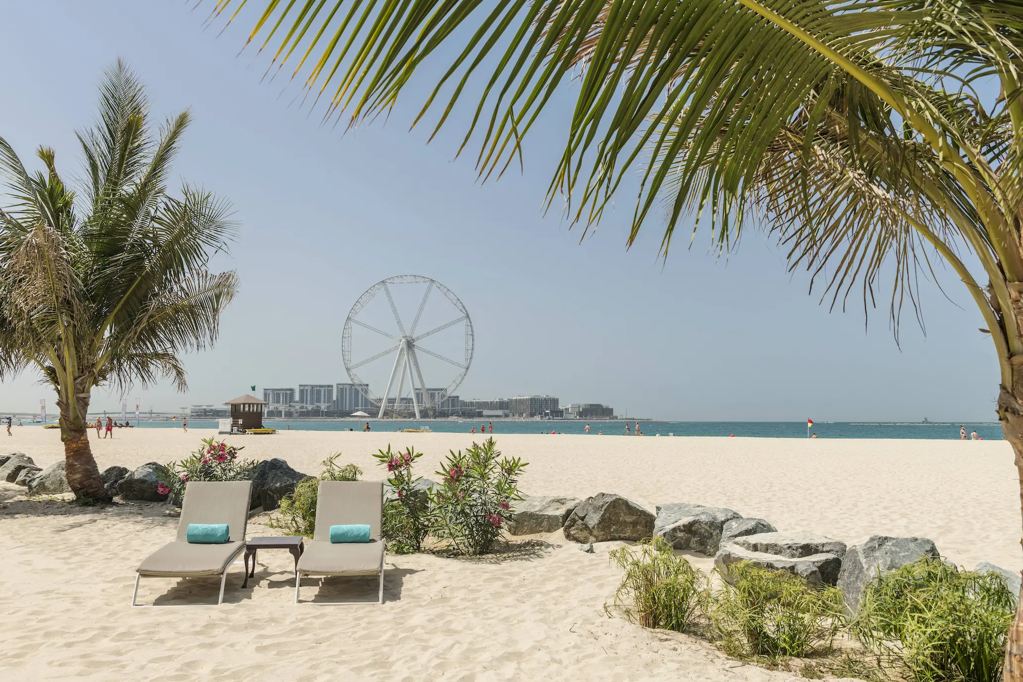 private beachfront at le royal meridien beach resort & spa dubai with sun loungers, soft sand, turquoise waters, and luxury resort setting