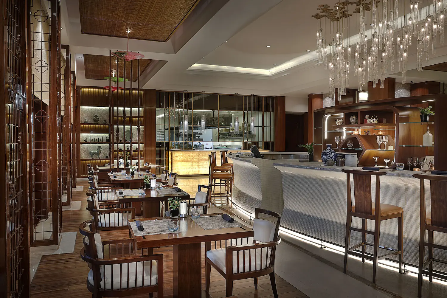 blue jade restaurant interior at the ritz-carlton dubai jbr featuring contemporary asian dining design, elegant seating, and stylish ambience in dubai marina