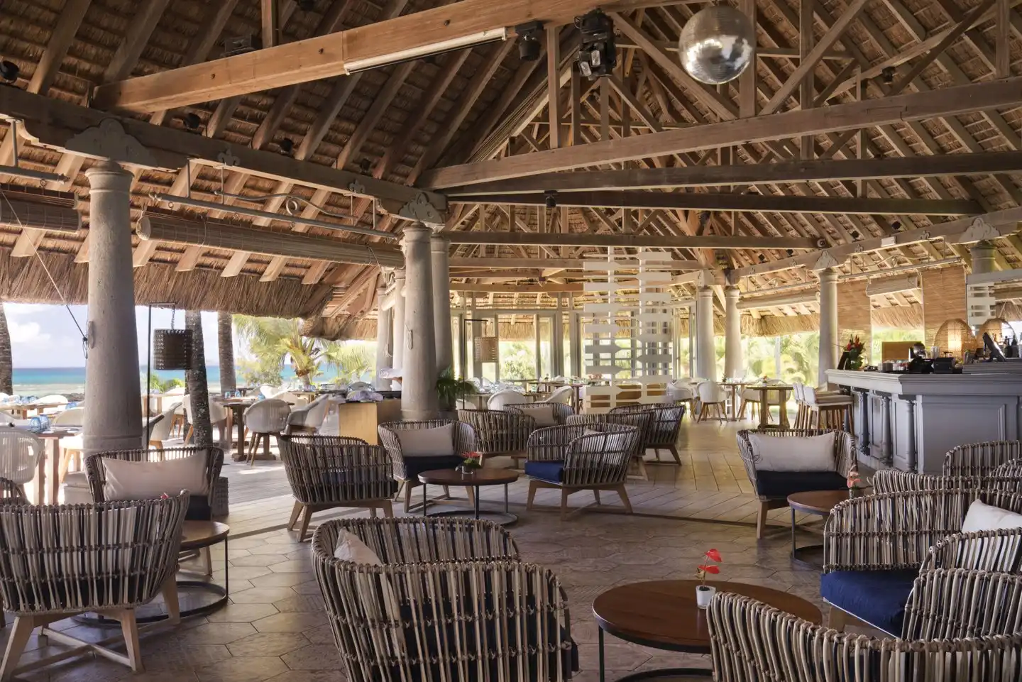 cannonier mauritius navigator bar perched on rocky outcrop at navigator restaurant with panoramic beach and sea views serving cocktails aperitifs sunset drinks and evening music and dancing