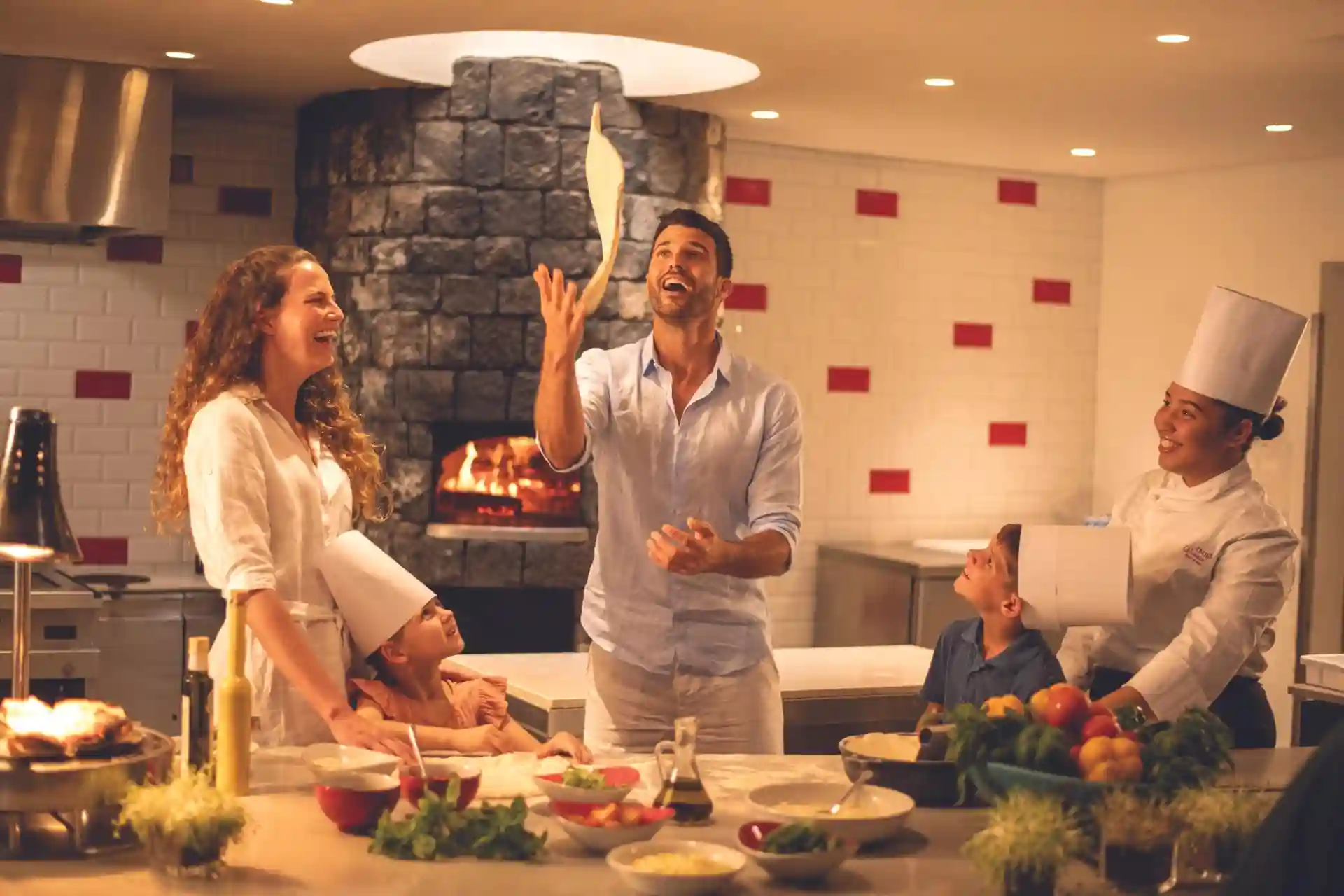 cooking class at cannonier mauritius with guests preparing local mauritian dishes