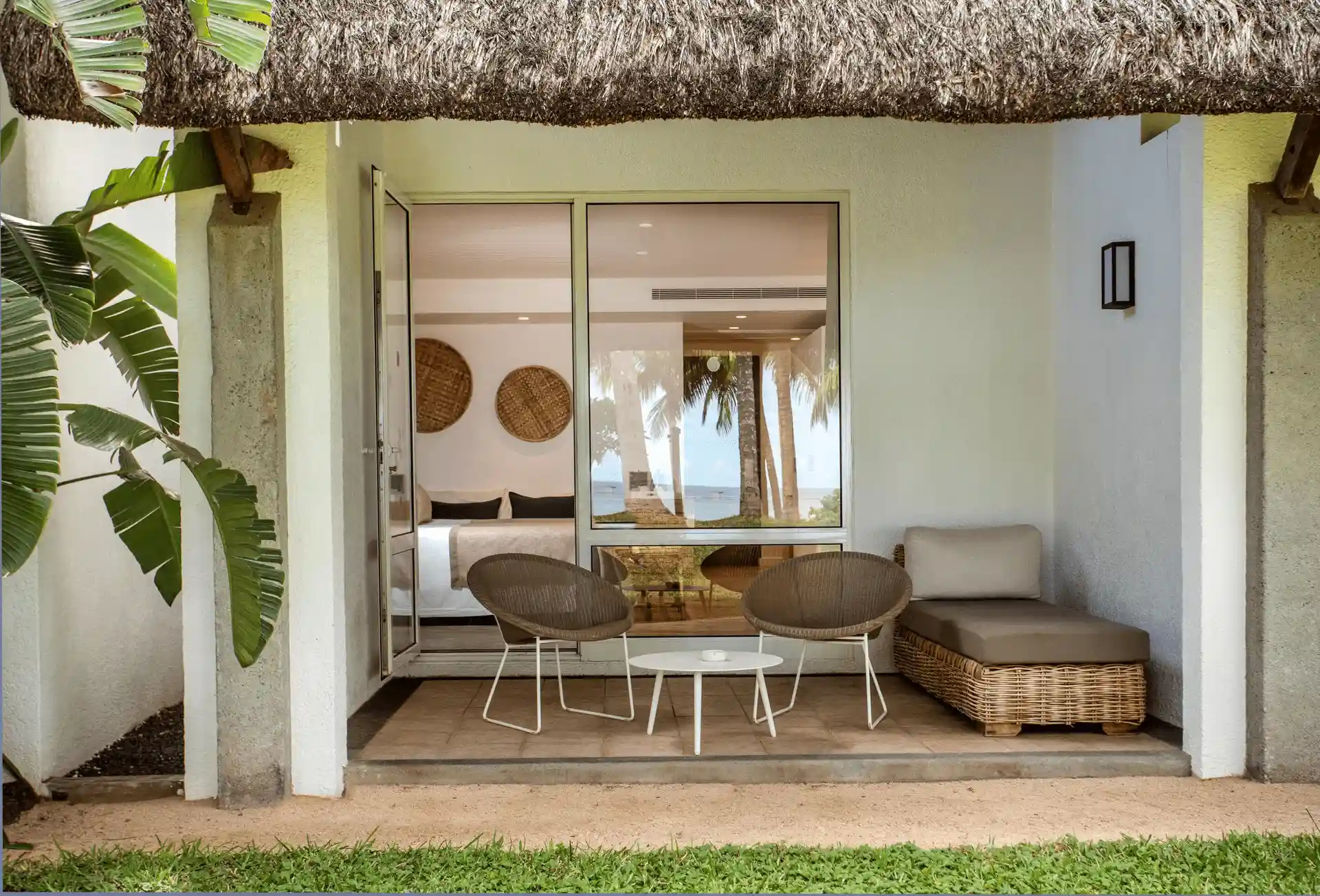 canonnier deluxe sea terrace with king bed and furnished oceanfront terrace