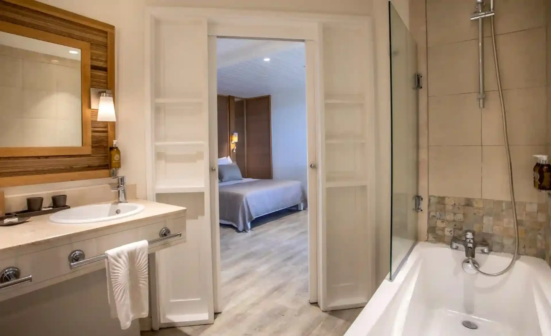 modern bathroom in superior room at canonnier mauritius with sleek fixtures and bright design