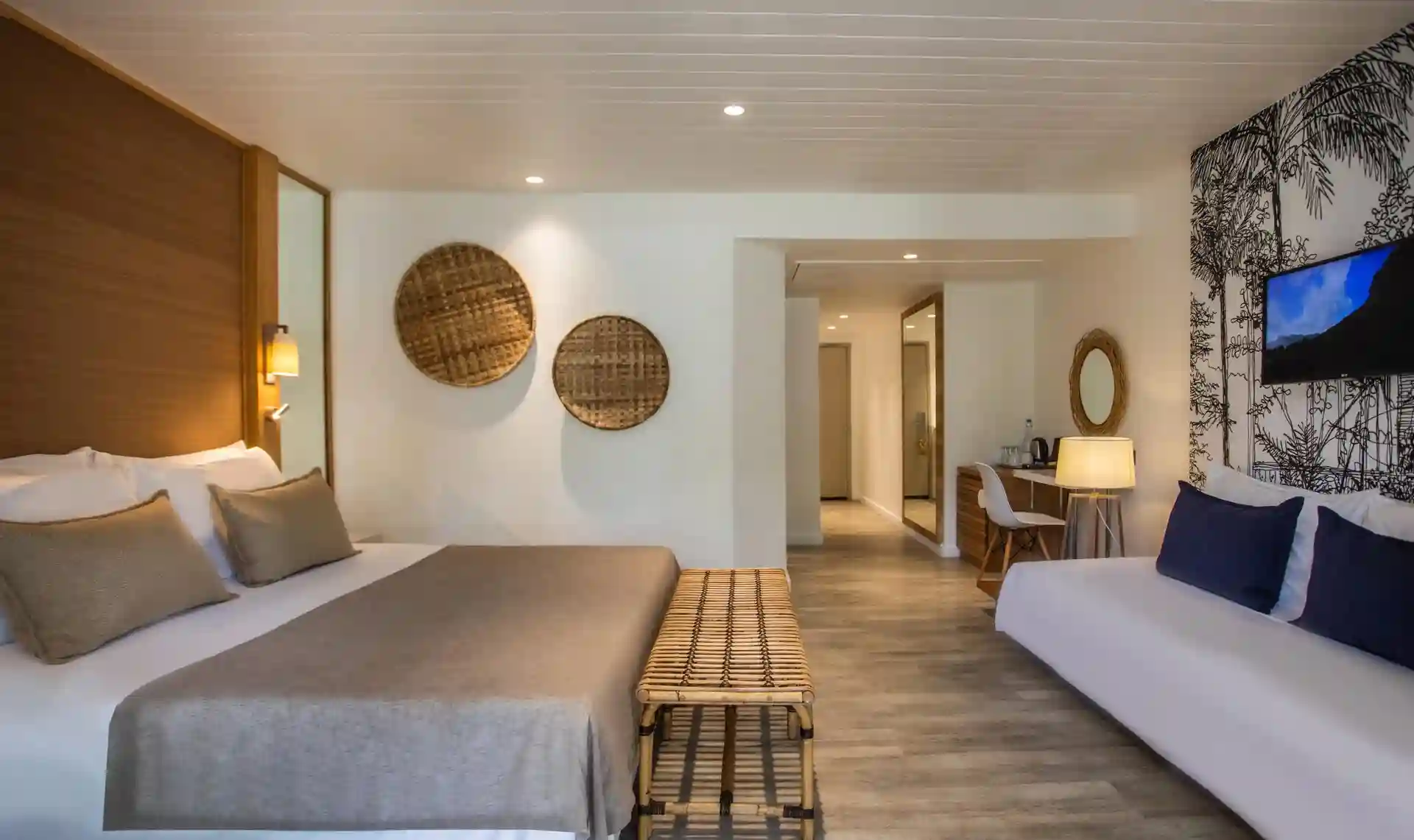 side view of superior room at canonnier mauritius showing balcony and tropical surroundings