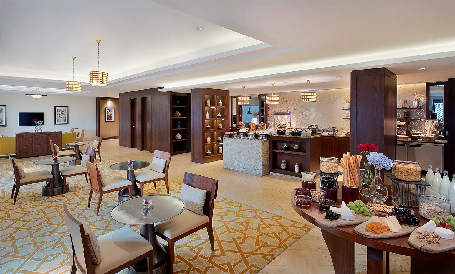 club lounge at the ritz-carlton dubai jbr featuring elegant seating, refined interiors, and exclusive club level dining with views towards the arabian gulf
