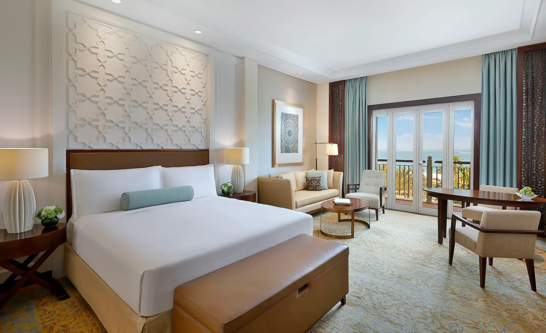 deluxe ocean view king room at the ritz-carlton dubai jbr luxury beachfront hotel in dubai marina featuring private balcony with arabian gulf views and elegant contemporary interiors