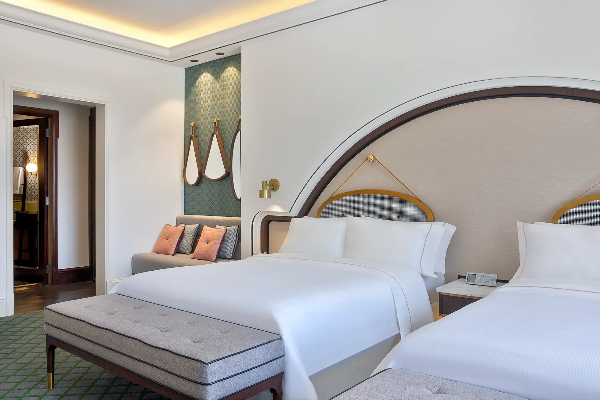 deluxe skyline twin bedroom at the westin dubai mina seyahi with two beds and floor-to-ceiling windows overlooking the dubai skyline