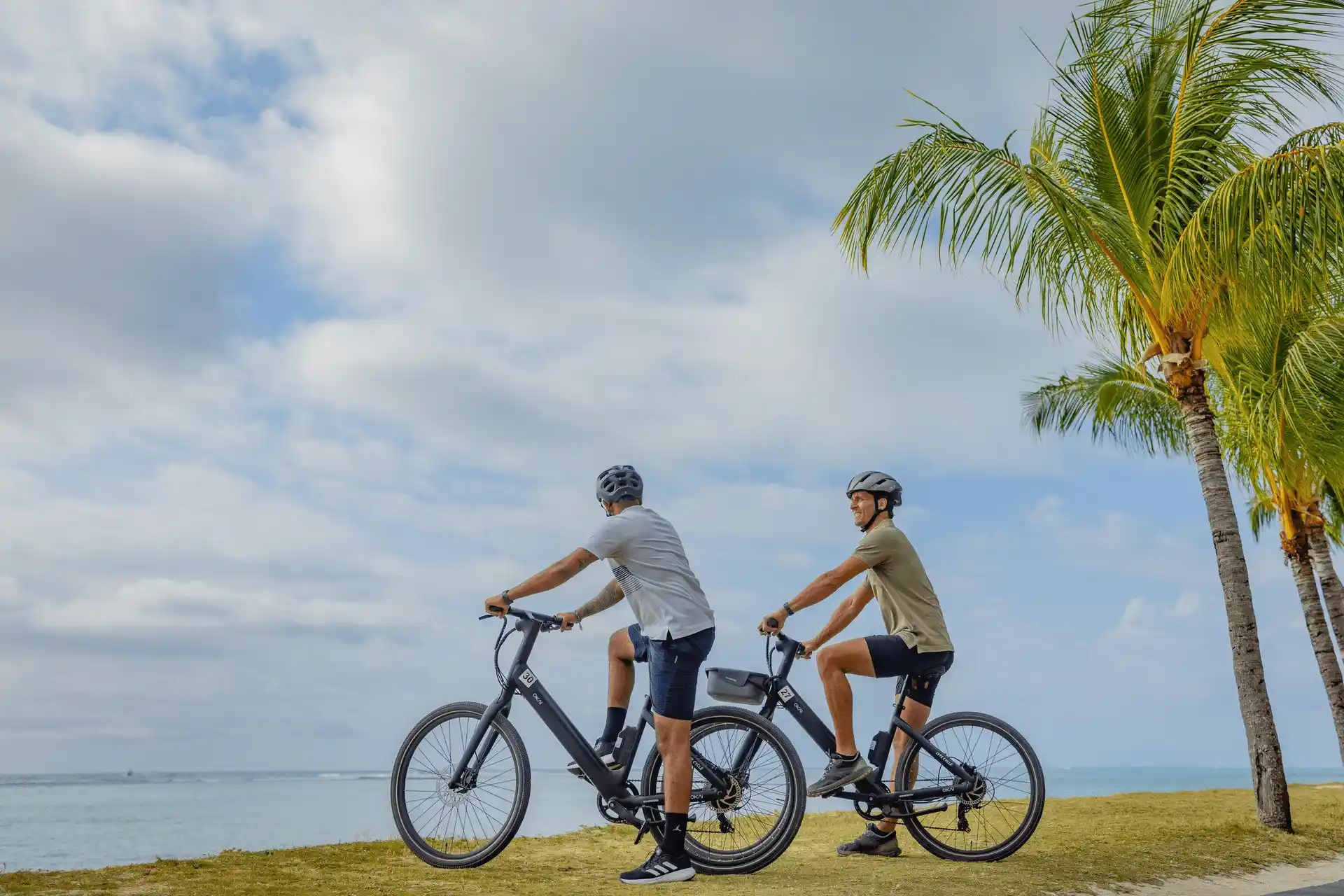 guests cycling and exercising at dinarobin mauritius resort grounds