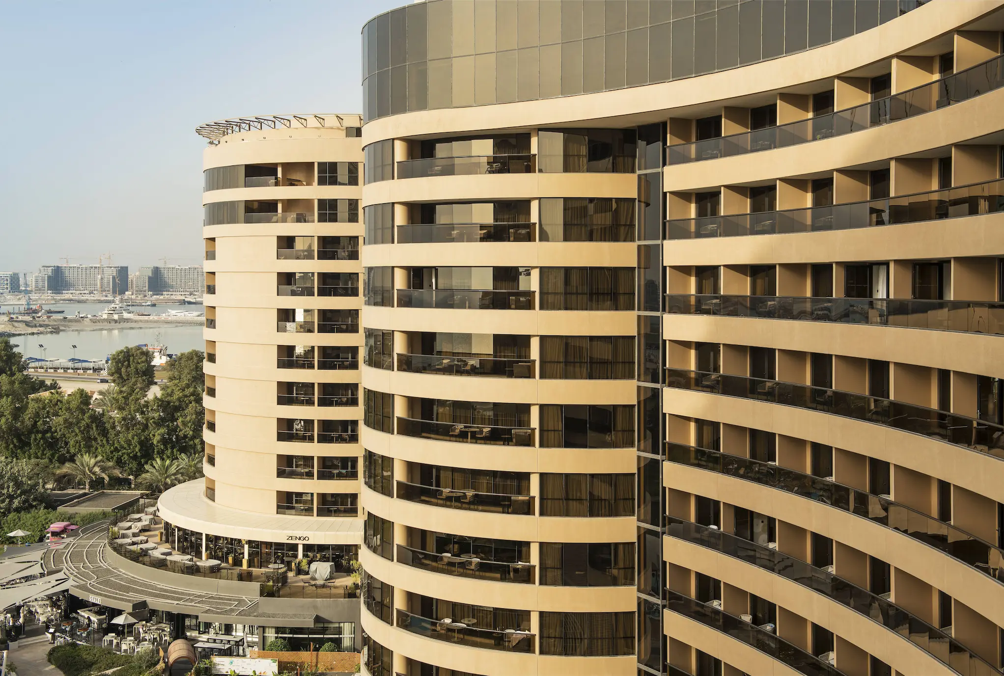 exterior view of le royal meridien beach resort & spa dubai showcasing luxury beachfront architecture, landscaped gardens, and Arabian-inspired design