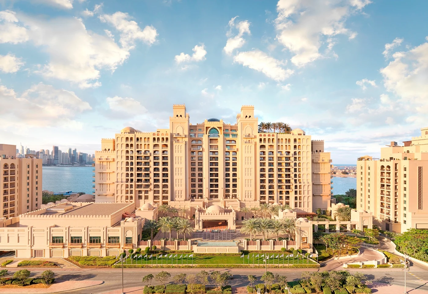 aerial view of fairmont the palm dubai luxury resort with private beach and pools