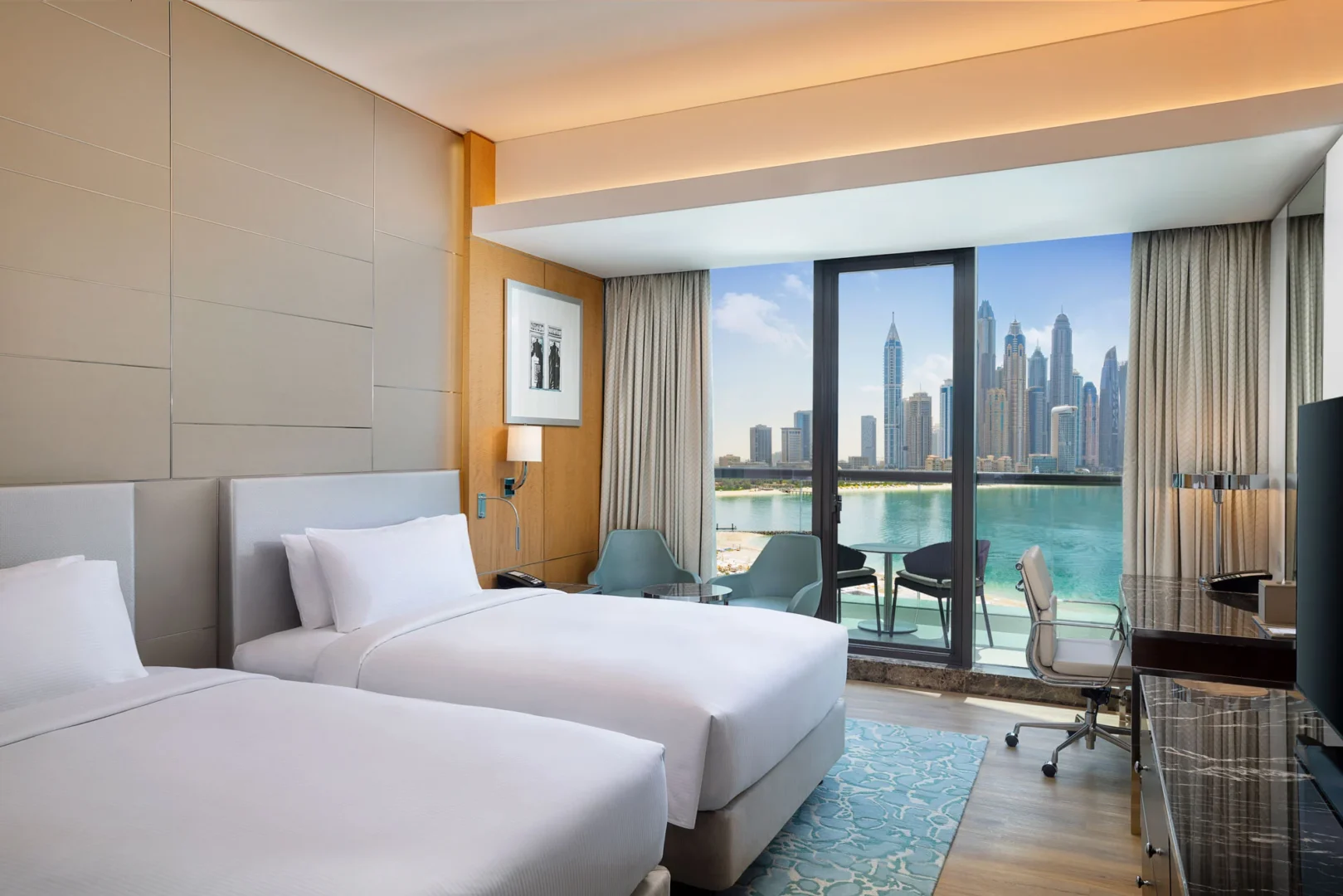 family connecting deluxe room with sea view twin bed at hilton dubai palm jumeirah
