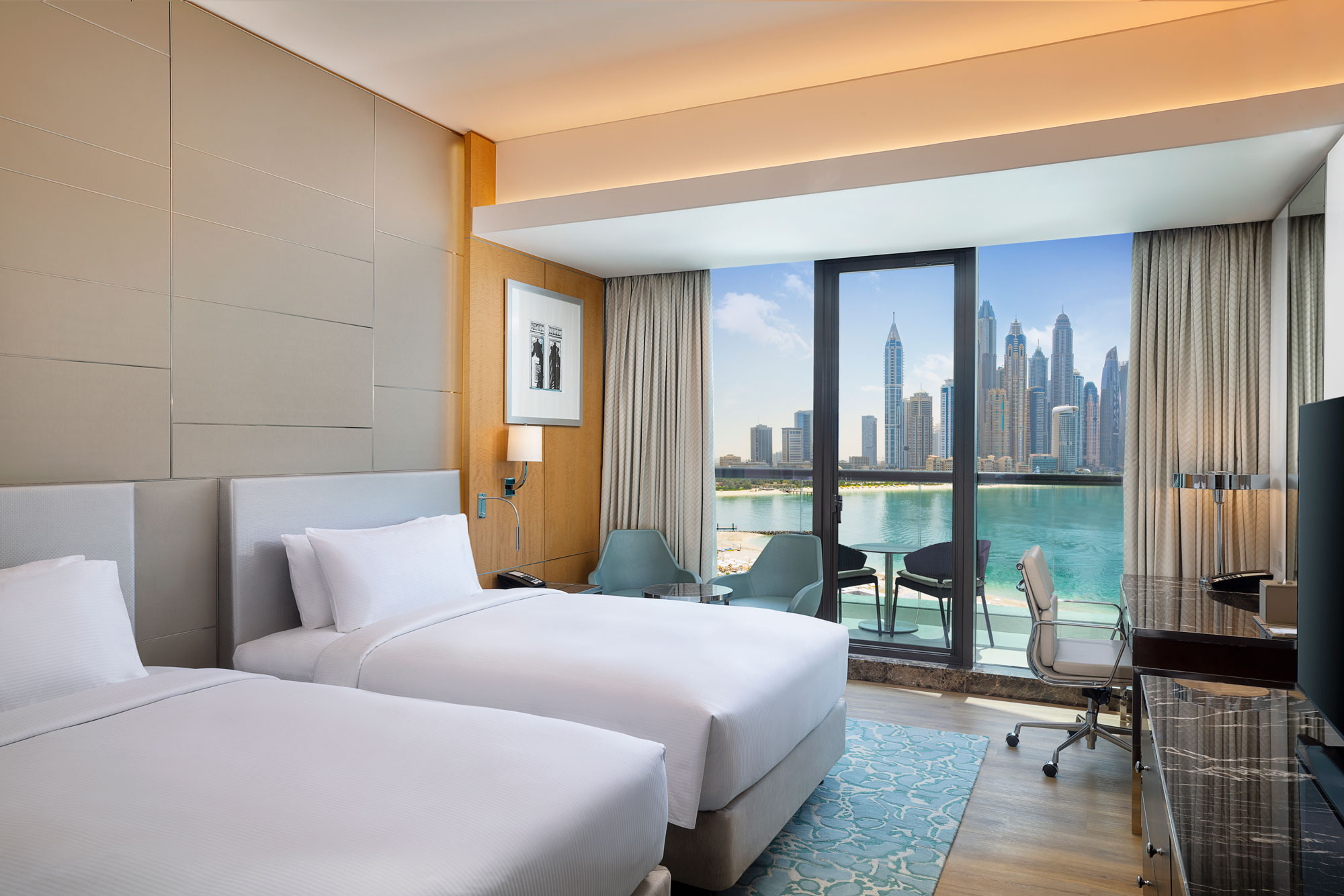 family connecting deluxe room with sea view twin bed at hilton dubai palm jumeirah