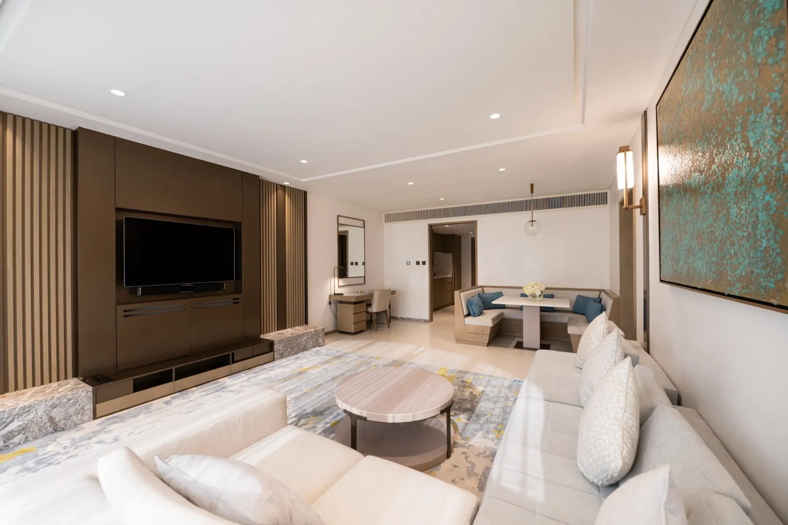 living room in family garden suite at Jumeirah Beach Hotel with spacious seating, modern décor and direct garden access
