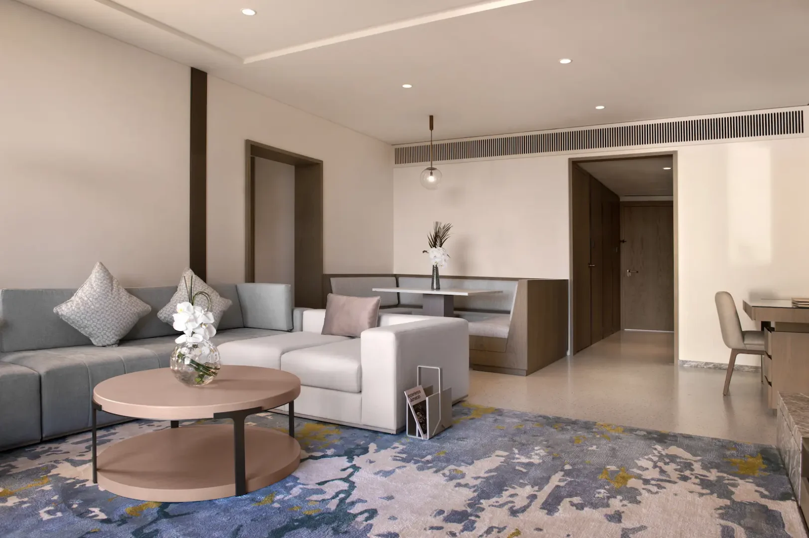 living room in family garden suite at Jumeirah Beach Hotel with spacious seating, modern décor and direct garden access