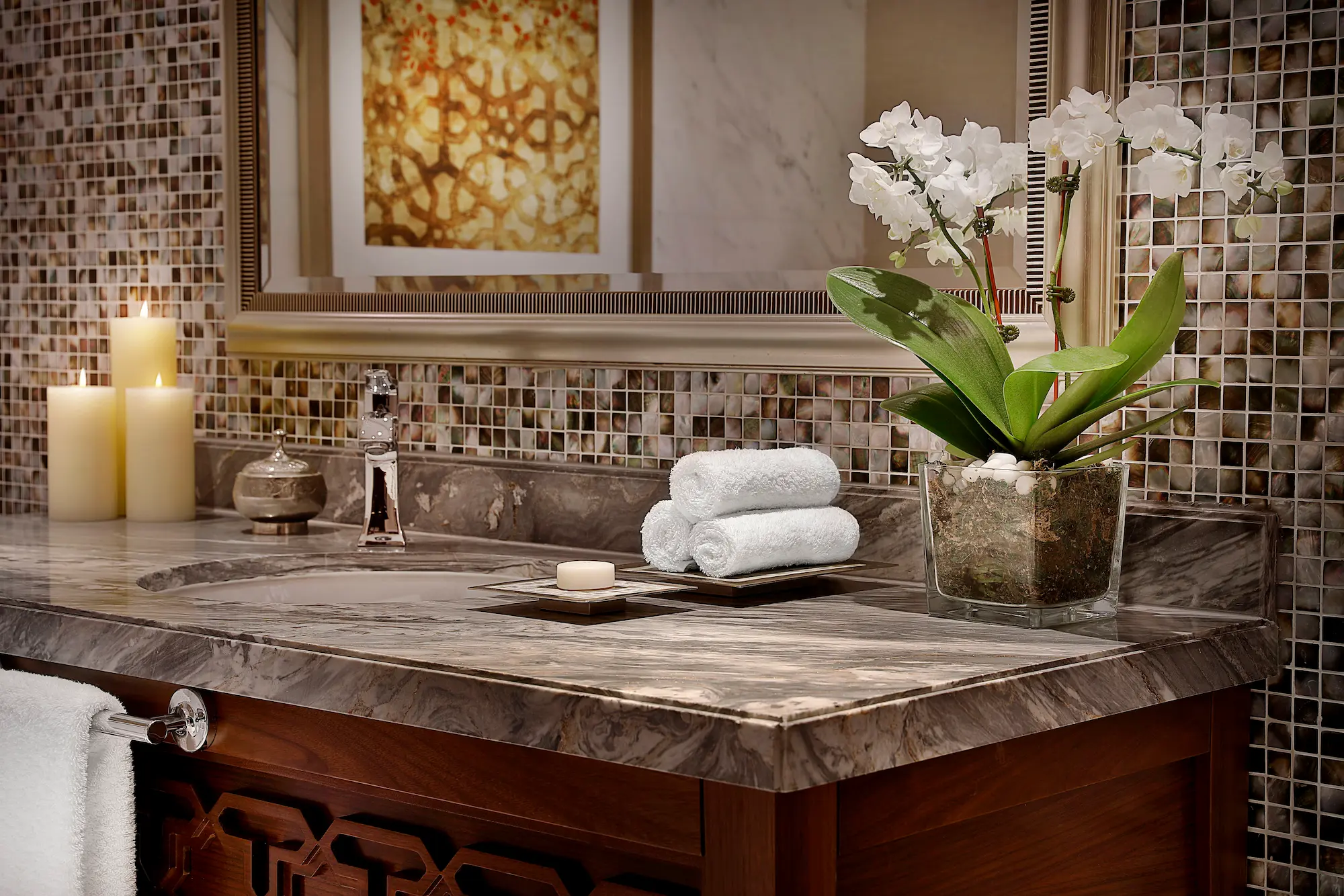 bathroom detail in family suite at the ritz-carlton dubai jbr featuring marble finishes, double vanity, walk-in shower, and luxury amenities in dubai marina