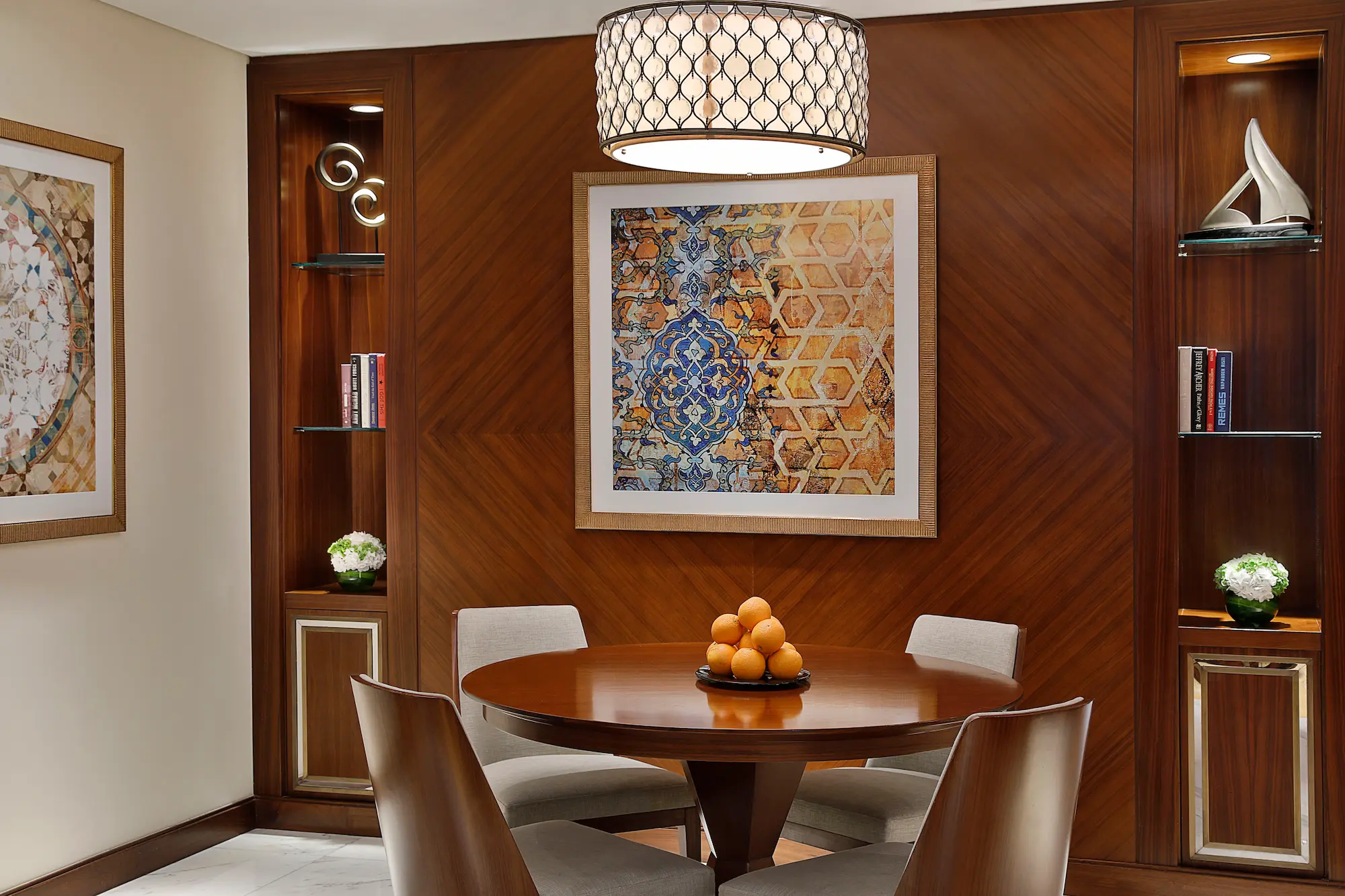 dining room in family suite at the ritz-carlton dubai jbr featuring elegant table seating, modern interiors, and luxurious beachfront hotel design in dubai marina