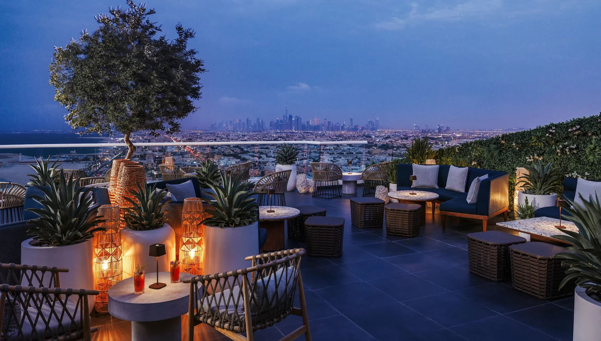 floor 24 terrace at Jumeirah Beach Hotel with elevated outdoor seating, panoramic arabian gulf views and stylish rooftop ambience