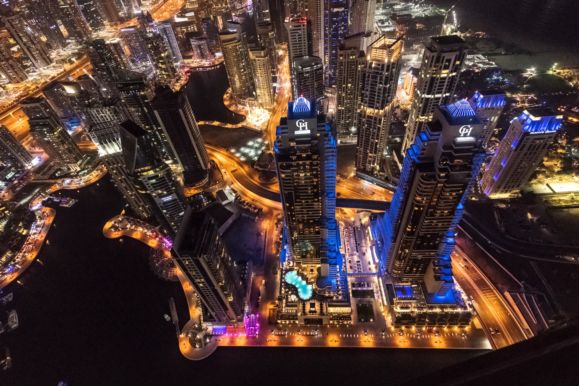 grosvenor house dubai exterior night showcasing the illuminated skyline and refined luxury presence