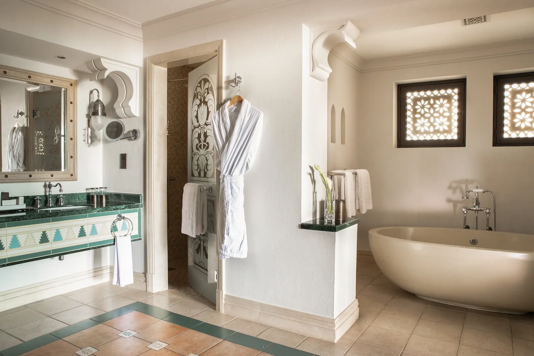 jumeirah dar al masyaf cove house garden room bathroom elegant marble bathroom with luxury amenities and garden villa style ambiance