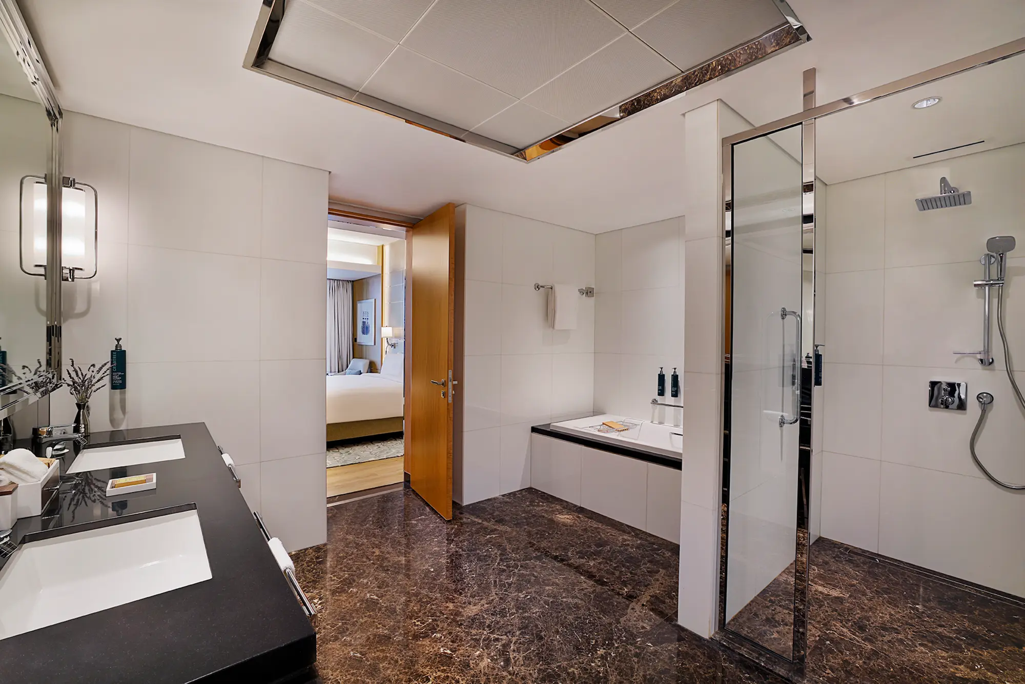 king one bedroom suite with sea view balcony shower at hilton dubai palm jumeirah