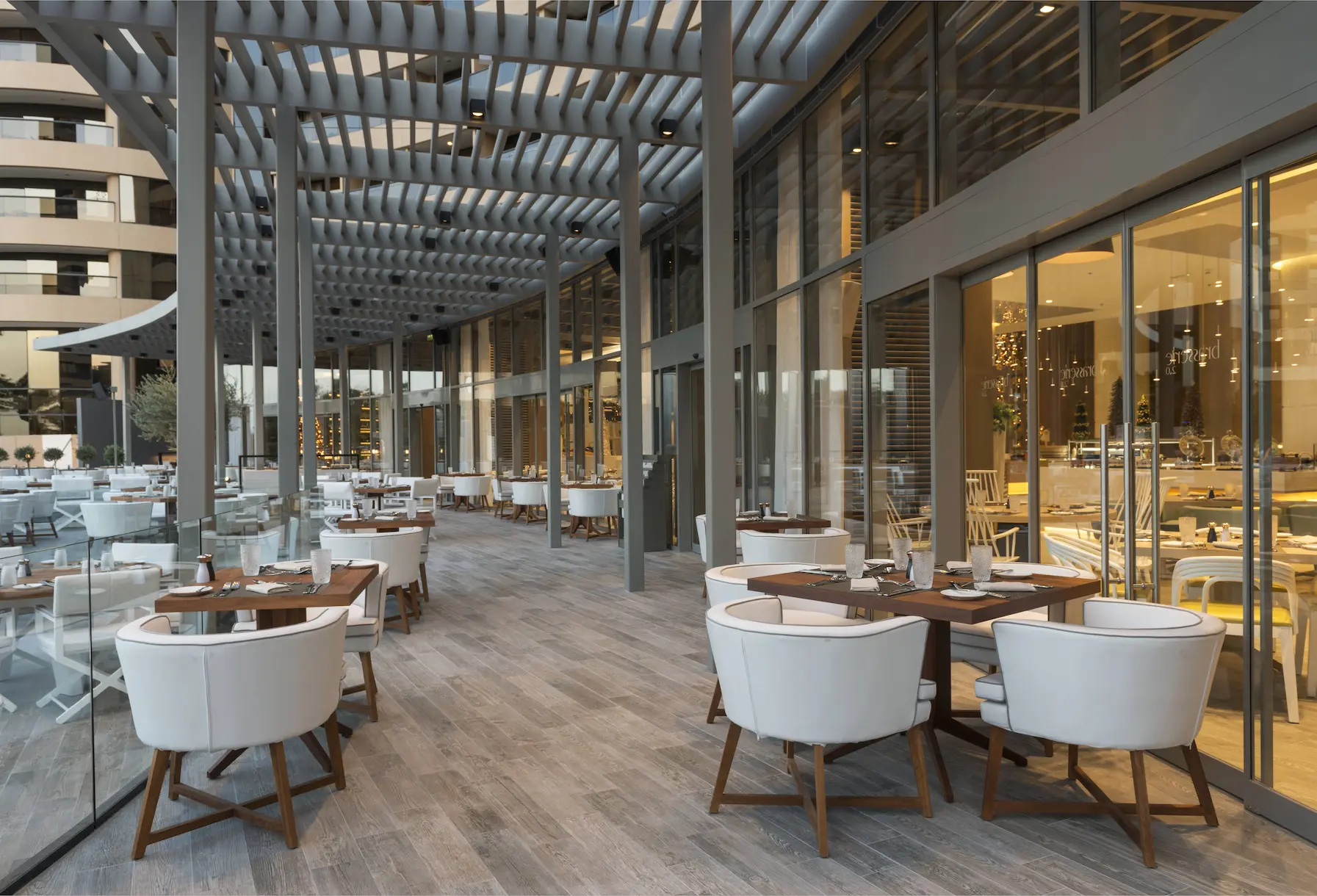 brasserie 2.0 interior at le royal meridien beach resort and spa dubai featuring contemporary décor, stylish seating and modern ambient lighting for a relaxed dining experience