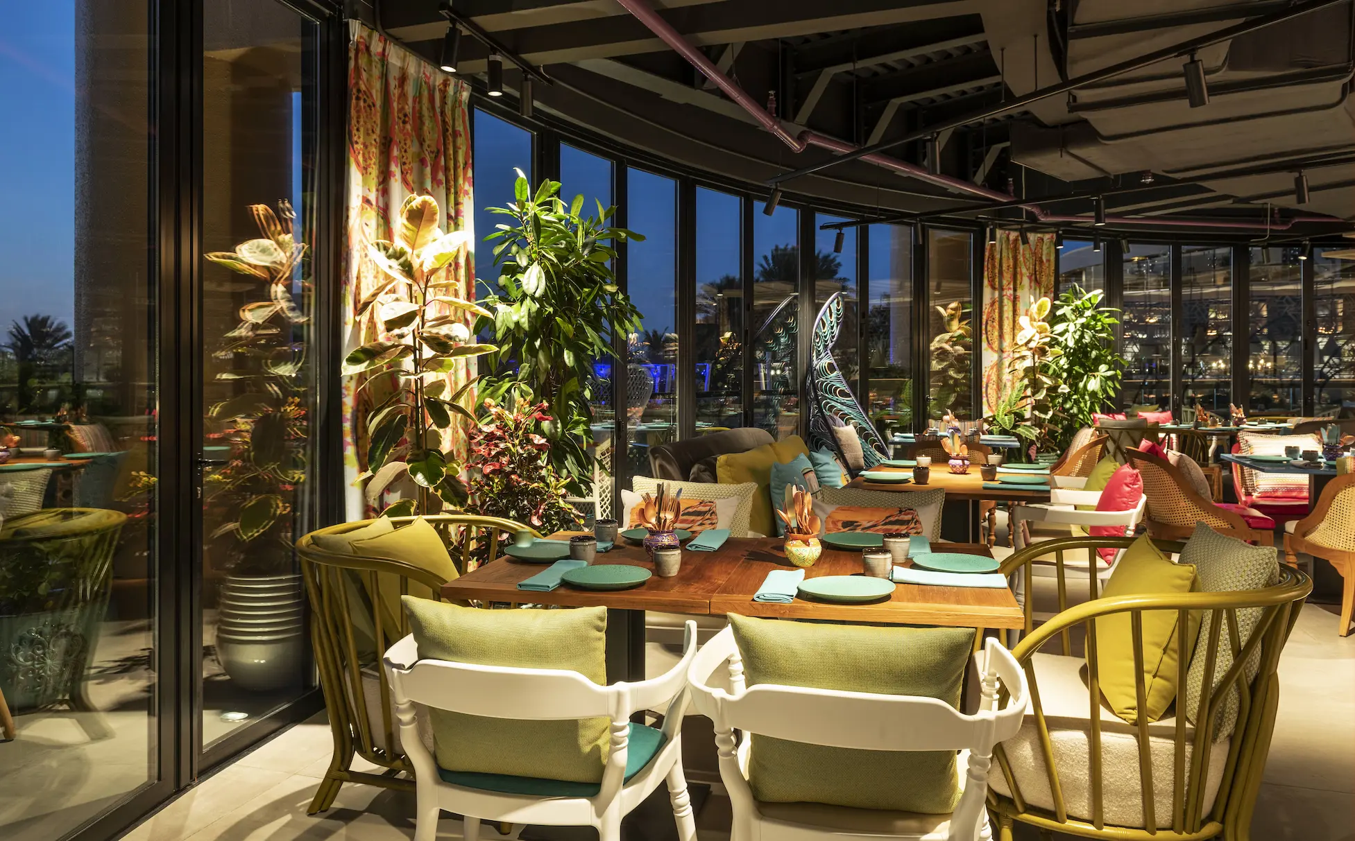indya by vineet restaurant interior at le royal meridien beach resort and spa dubai featuring contemporary indian-inspired décor, elegant dining tables and ambient lighting for a