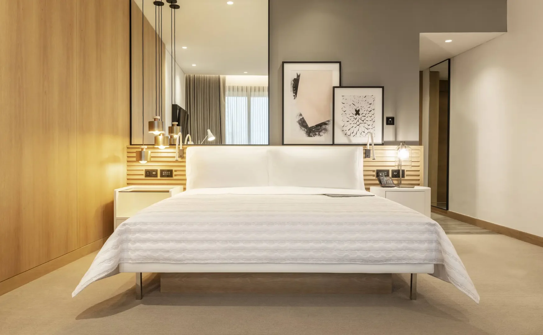 royal club king bedroom at le royal meridien beach resort and spa dubai featuring king-size bed, contemporary furnishings and floor-to-ceiling windows with views of the arabian gulf or resort gardens