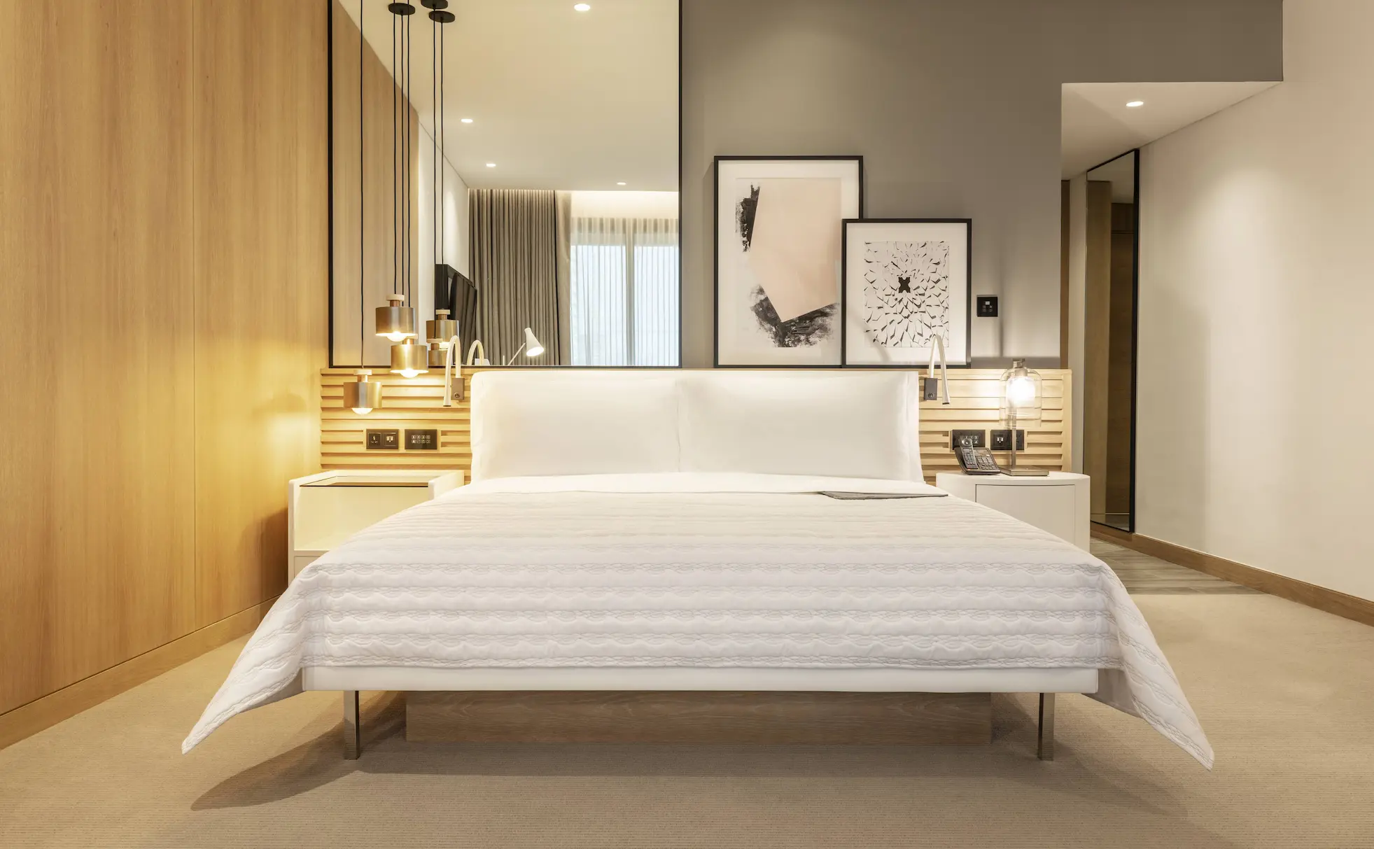 royal club king bedroom at le royal meridien beach resort and spa dubai featuring king-size bed, contemporary furnishings and floor-to-ceiling windows with views of the arabian gulf or resort gardens