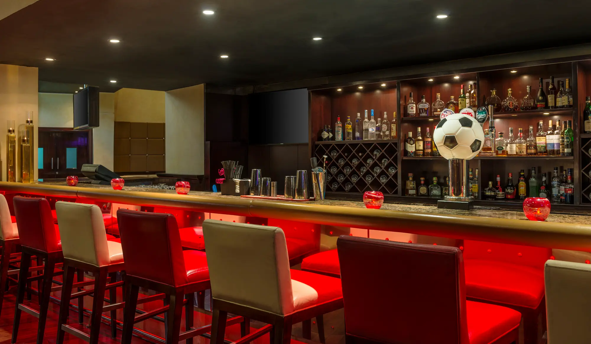 shades bar interior at le royal meridien beach resort and spa dubai featuring modern stylish décor, comfortable lounge seating and ambient lighting for a relaxed drinks experience